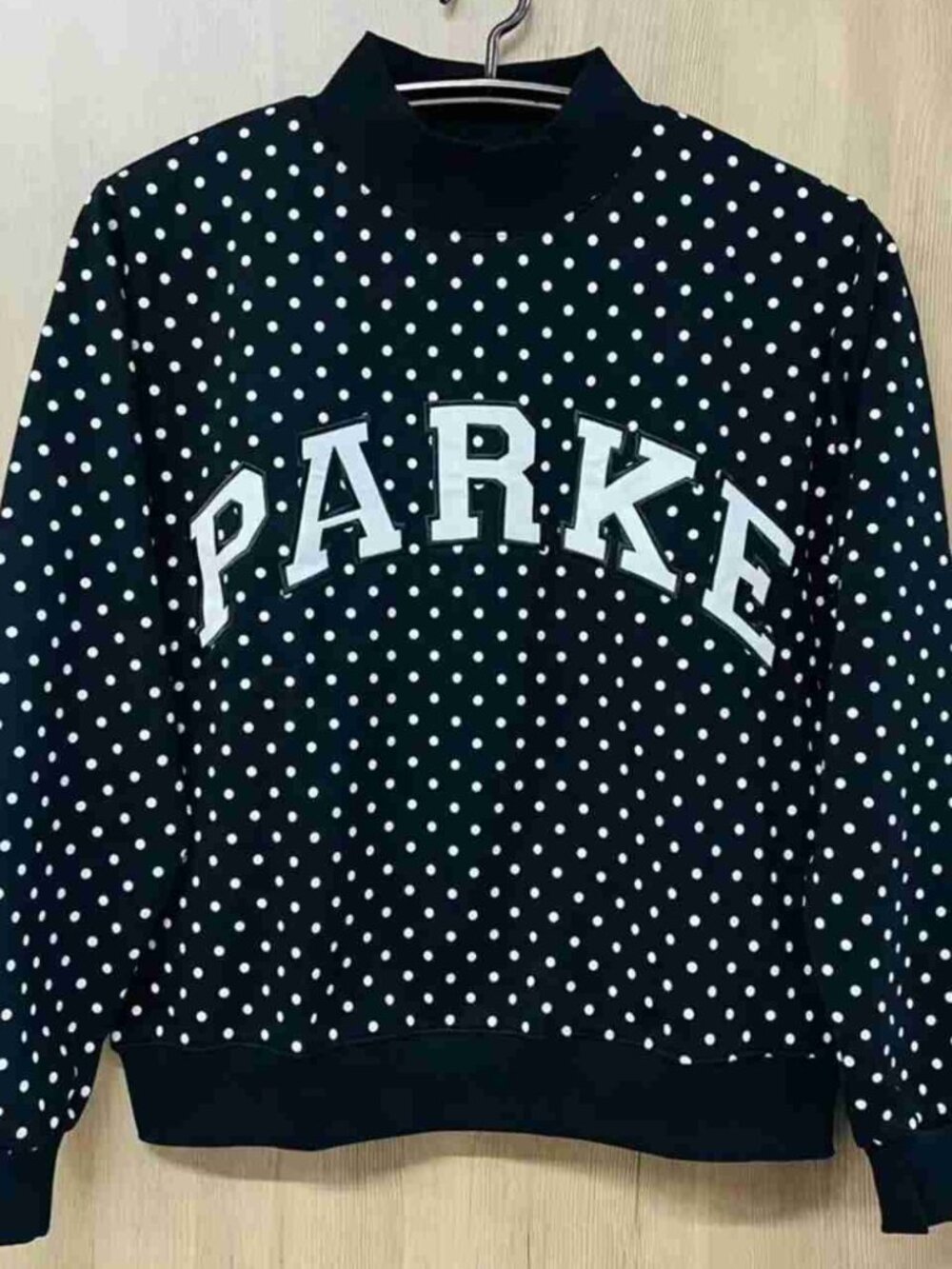 PARKE Black Polka‑Dot Mock‑Neck Sweatshirt White Varsity Letter Applique